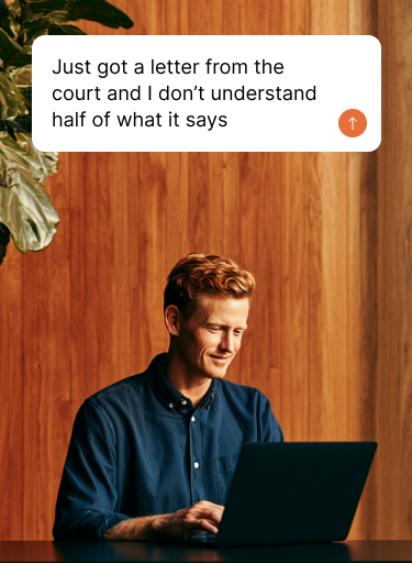 A person with a laptop, at ease